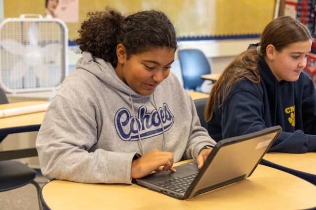 a Cohoes High School student works on a computer